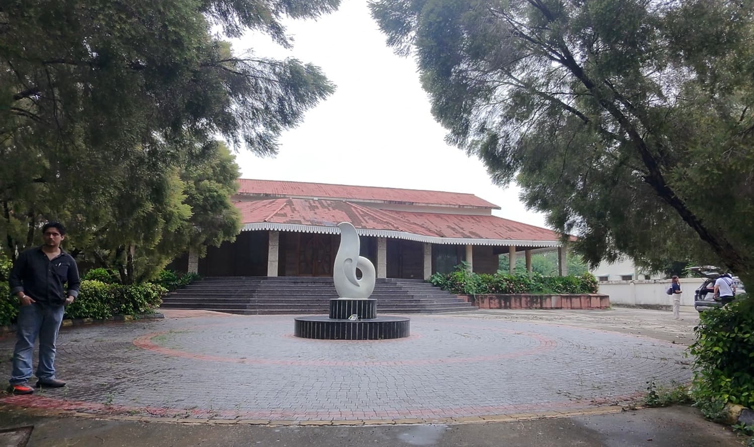 White villa with stone balcony and balustrades