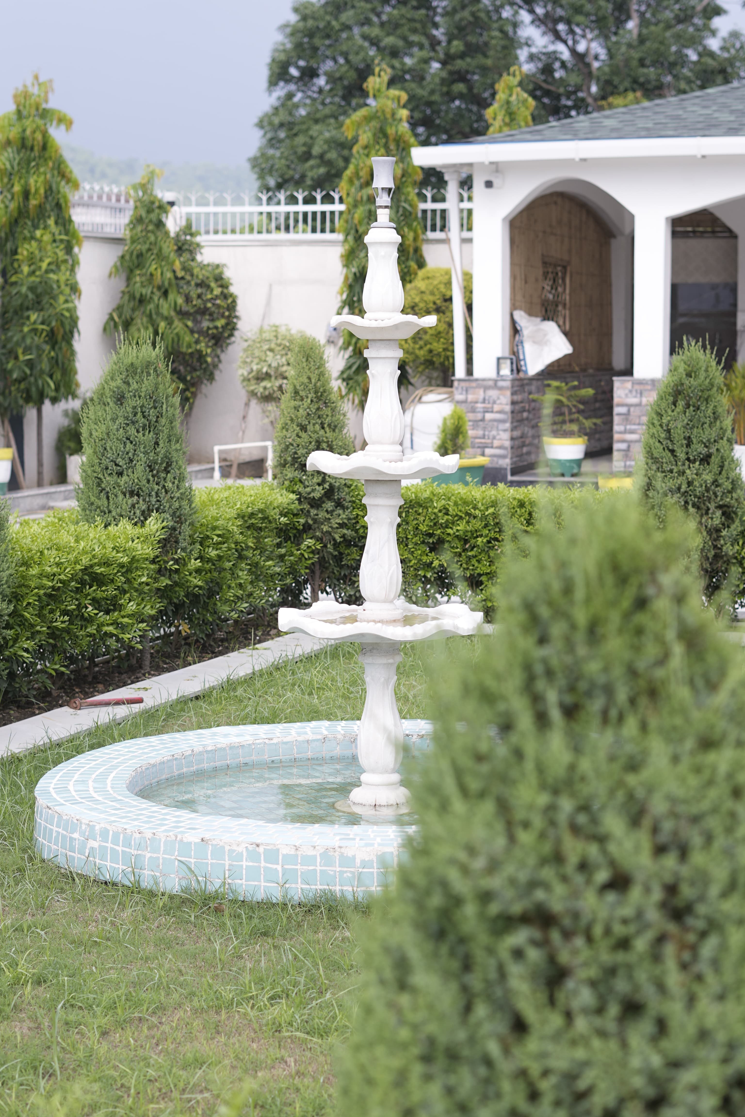 Villa garden with fountain and landscaping